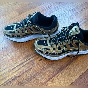 Men’s size 8 Nike Black and Gold P-6000 athletic shoes